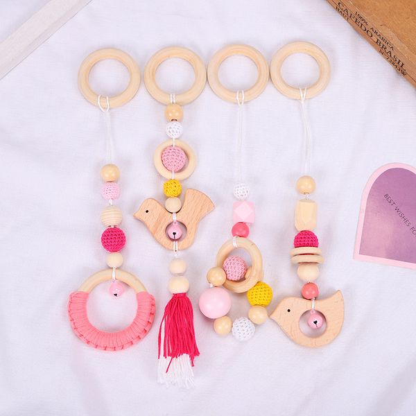 

4pcs/lot baby toys silicone beads teethers wooden rings handmade bracelet pacifier chain clips teething pram stroller bell 2020