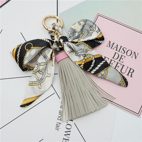 

cute bow knot keychain with pu leather tassels for bag car ornaments key ring charm laveros porte clef key chain jewelry h bbyotb