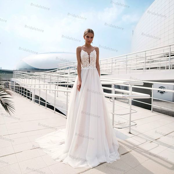 

elegant lace bohemian wedding dresses 2021 spaghetti straps lace applique bridal gowns backless a line wedding dress robe de mariee, White