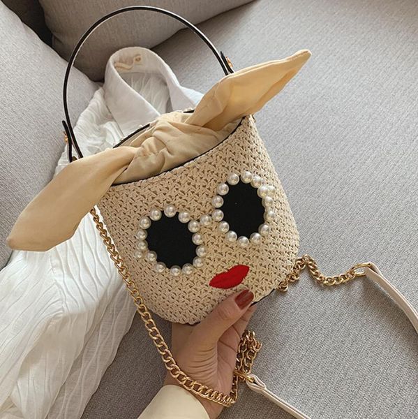 

straw portable small bag female 2020 new cartoon big eyes beauty bag wild fashion pearl woven shoulder slung bucket boutique