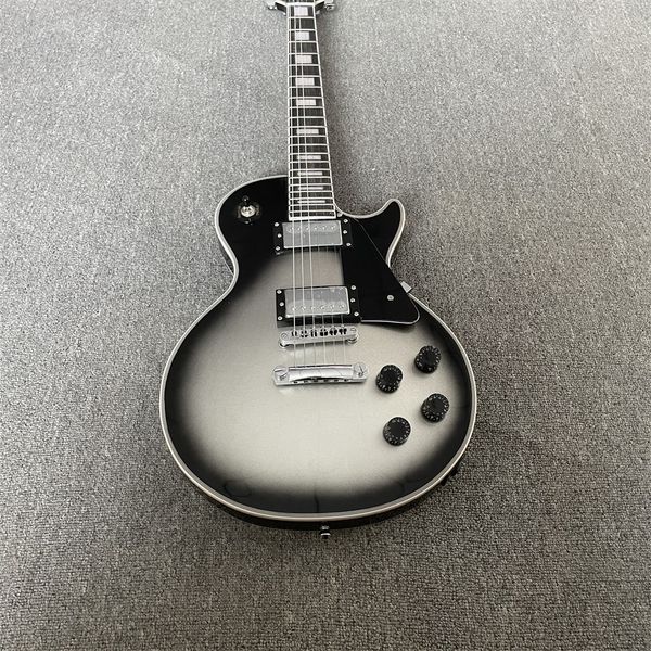 

electric guitar, rosewood fingerboard, silverburst color, chrome hardware, solid mahogany body electric guitar
