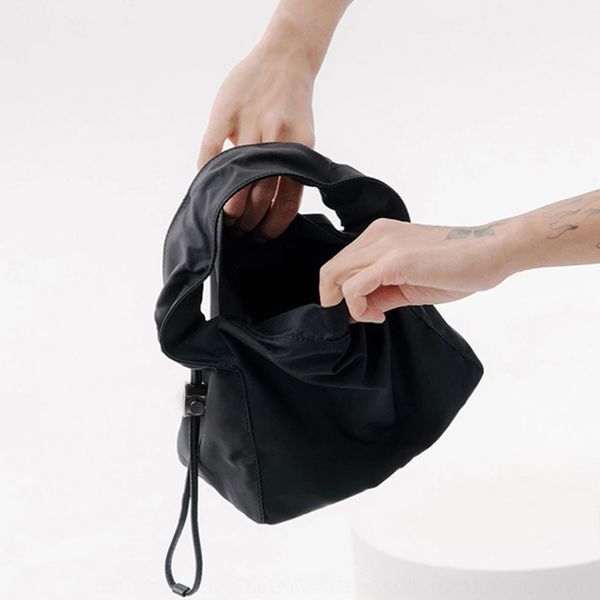 

guangzhou women's summer new style simple waterproof hand lace lace lacelady's wrinkle portable armpit wrist bag women's bag
