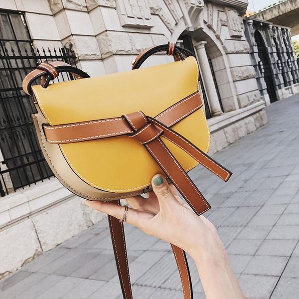 

summer small bag female 2020 new style bump color one shoulder bag han version 100 take cross-body contracted fashion saddle