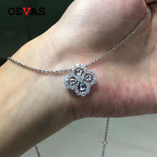 

oevas 100% 925 sterling silver sparkling aquamarine hollow out four leaf clover pendant necklace for women party fine jewelry 1027