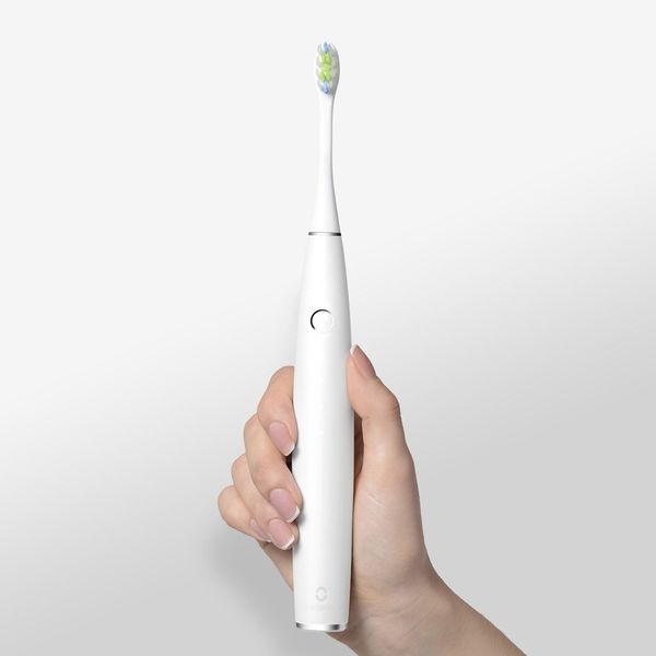 

oclean one electric toothbrush with 2 brush heads