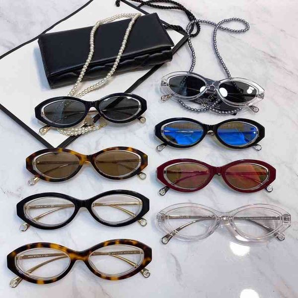 

2022 factory wholesale family personality oval cat's eye sunglasses women's net red samayu same pearl chain sunglasses, White;black