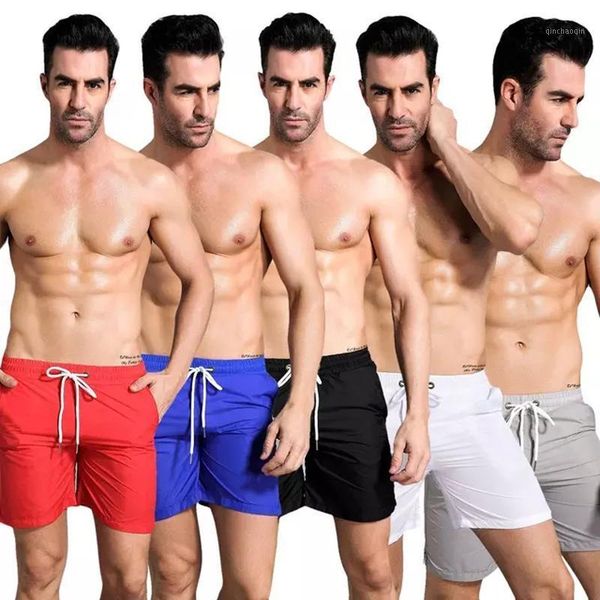 

2021 men's sports night running shorts fitness quick dry basketball breathable leisure beach solid color sport shorts1, Black;blue
