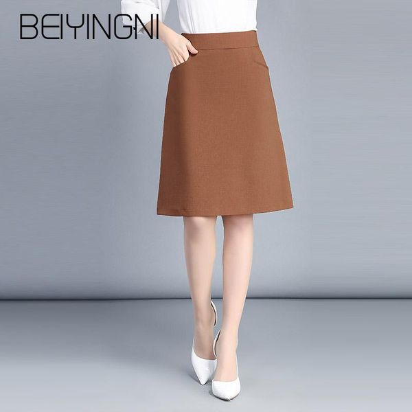 

beiyingni plus size office lady skirts black pockets elastic high waist skirt korean work wear midi skirts fashion clothing
