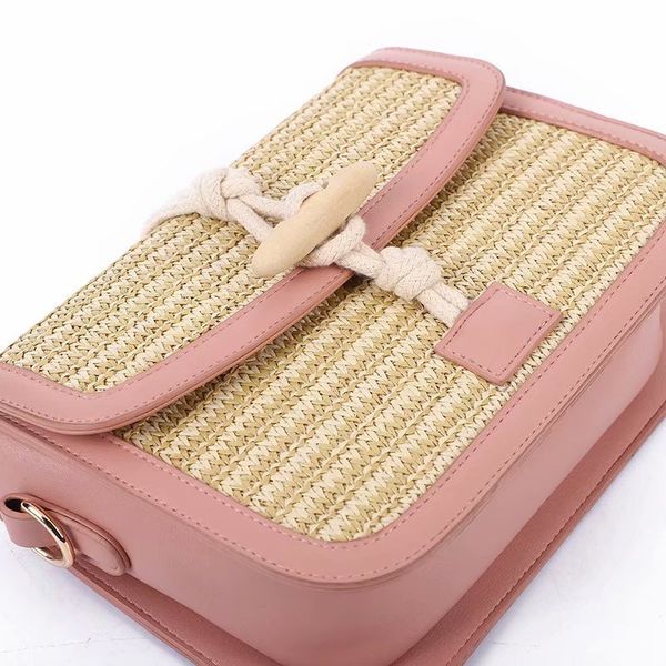 

2023 fashion straw woven bag spring/summer new foreign trade cowhorn buckle retro diagonal patchwork postman shoulder bag