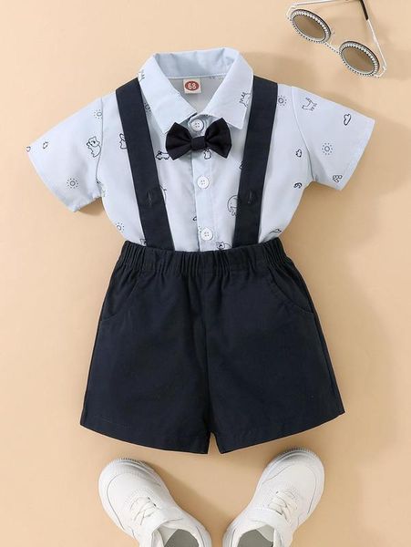 

baby cartoon graphic bow front button up bodysuit & suspender shorts she, White