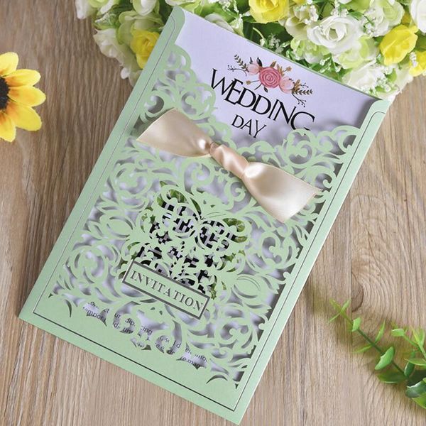 

greeting cards 30pcs/lot laser cut hollow pearl paper wedding invitations withribbon bow business birthday party invitation