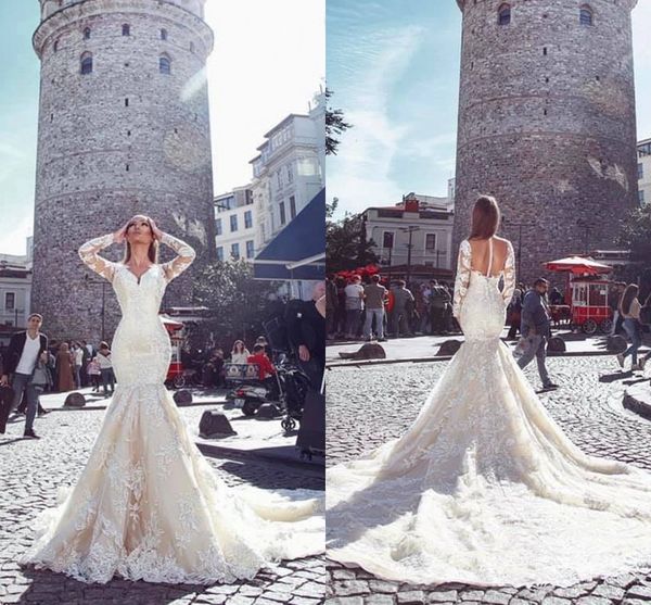 

2021 mermaid wedding dresses with long sleeves vintage lace appliques bridal gowns court train illusion buttons back vestidos al7337, White