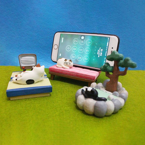 

japan cute kawaii cartoon pet animals maneki neko calico black cat stretch watching tv phone holder figures deskhome decor
