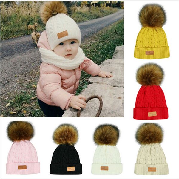 

2020 children kids twist kintting beanie hats winter warm crochet tuques designers infants toddler skull caps with fur pom headwear e101002, Yellow