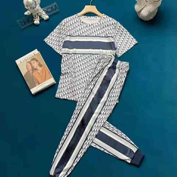 

2022 factory wholesale new model summer leisure sports suit women's short sleeved trousers two-piece loose version, White