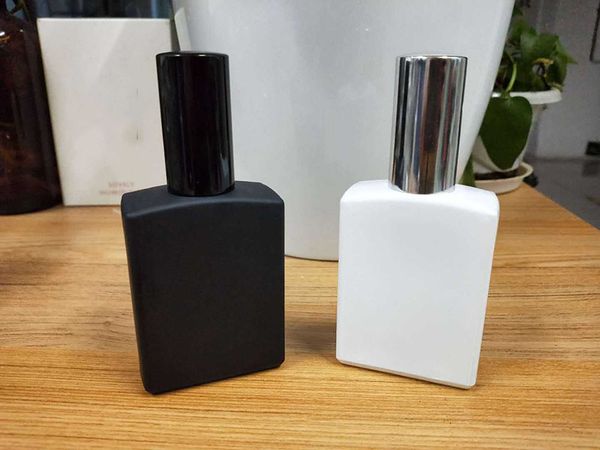 

50ml perfume sub-bottle spraying light-proof glass pressing liquid spray bottle wholesale