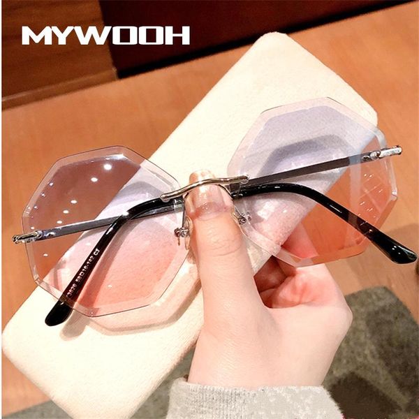 

nywooh rimless солнцезащитные очки женщины luxury огранка алмазов объектива круглый вс очки дамы марка дизайнера прозрачный коричневый оттен