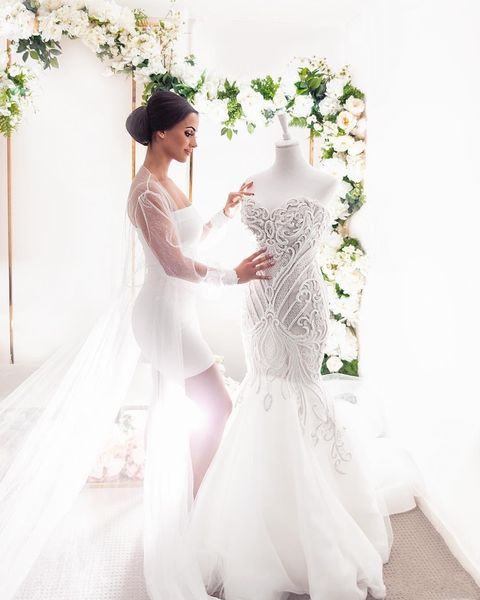 

mermaid wedding dresses lace applique robes de mariée with buttons back tulle sweep train beach bridal gowns robe de mariee, White