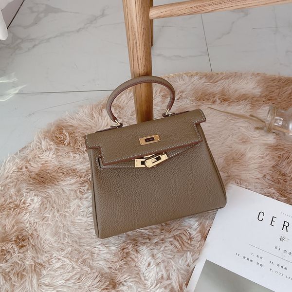 

the second generation kelly imported cowhide one-shoulder handbag bag, Black;red