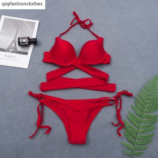

a bikini, with red steel clasp and bikini swimsuit, White;black