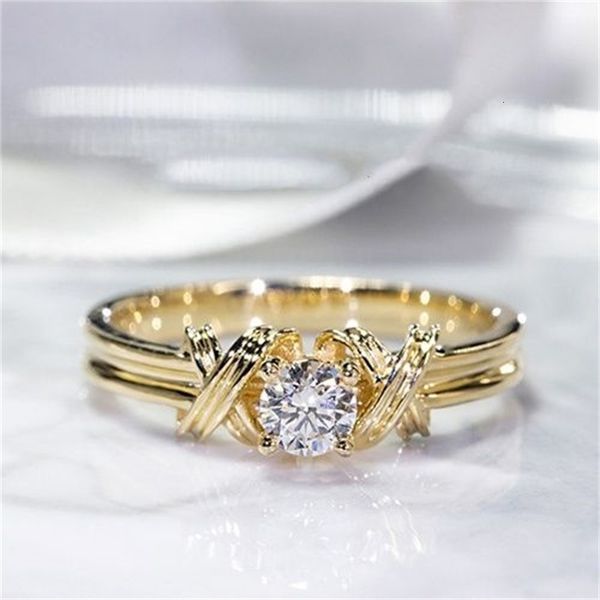 

elegant woman ring 14k gold diamond interwoven