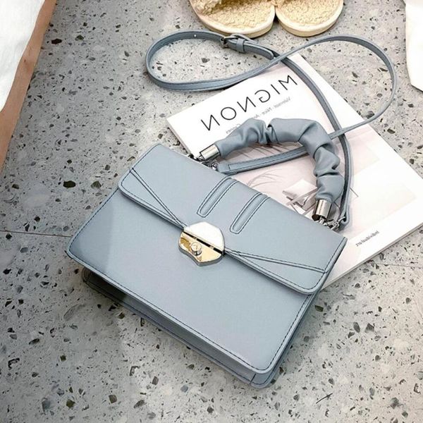 

shoulder bags solid color pleated flip tote bag 2021 fashion high-quality pu leather women's designer handbag lock messenger