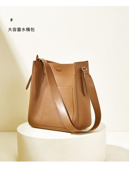 

2020 new cowhide handbags korean version of one-shoulder diagonal retro bag niche design large capacity bucket bag