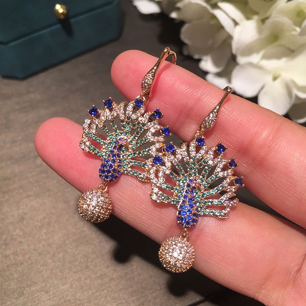 

ball peacock earrings female hollowed-out color gradient elegant atmosphere hipster super immortal micro-inlaid blue fan earrings, Silver