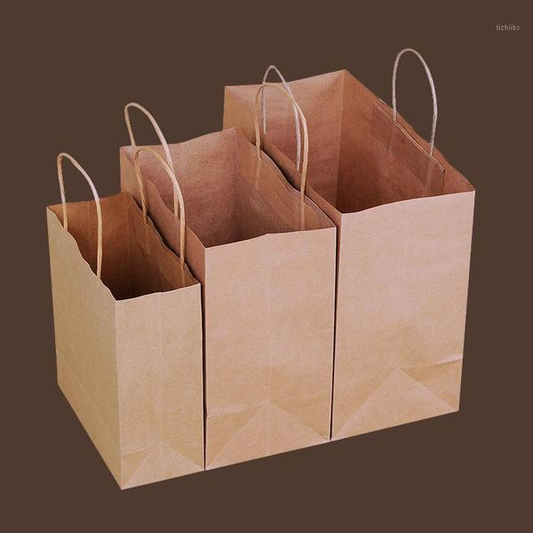 

10 pcs 3 sizes brown kraft paper bag with handle clothing bread candy buffet bags packaging boutiques bento custom1