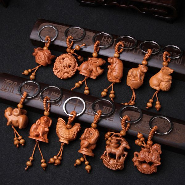 

ethnic natural chinese style 12 zodiac keychain engraving wood car ring creative animal dragon snake dog key chain