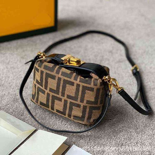 

2022 factory wholesale new [bighead wood]new mini old flower stick lunch box embroidered canvas with cow leather oblique cross women's