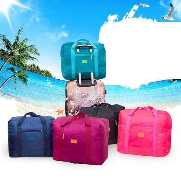 

travel folding bags travel pouch waterproof handbags women luggage packing cubes totes large capacity bag wholesale1