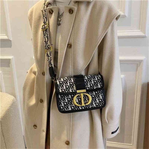 

design minority light luxury female winter small square wide shoulder strap messenger bag high sense commuter bag handbags