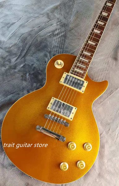 

high-quality electric guitar, mahogany body, rosewood fingerboard, golden shiny, in stock, lightning delivery,