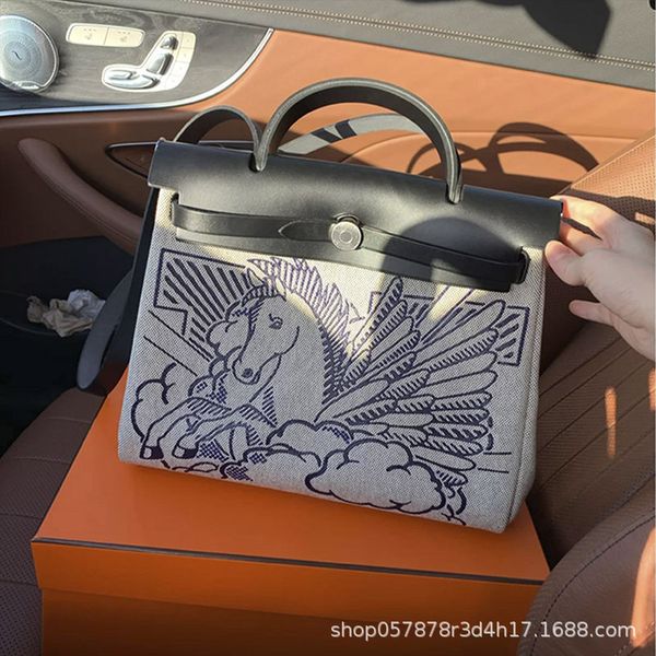 

new fashion women's net red same large capacity one shoulder cross carrying canvas pegasus kelly bag