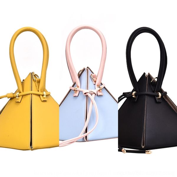 

rwazk 2019 new online red personalized carry shoulder messenger fashion versatile triangle hand hand hand bag three dimensional pyramid with