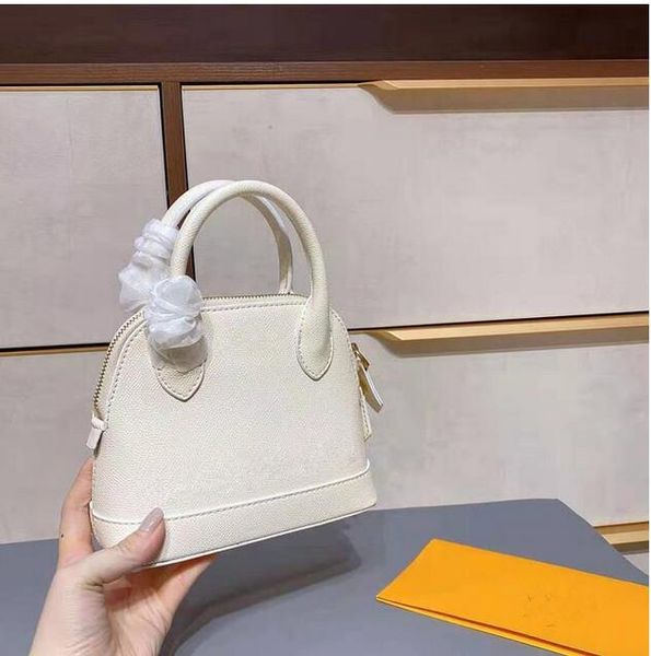 

the new 2021 ss shells bag leather female inclined girls women shoulder bags color matching printing worn handbag