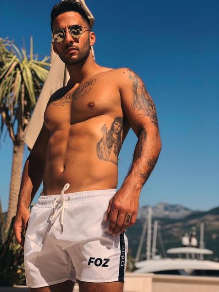 

2020 nian summer new style men's casual shorts muscle brothers fitness shorts sports running beach, Black;blue