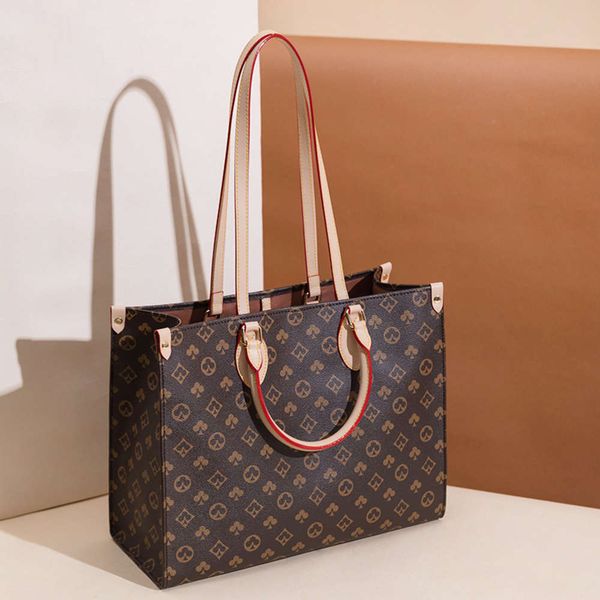 

luxurys designers fashion handbag simple file big printing women's shoulder style temperament computer bag