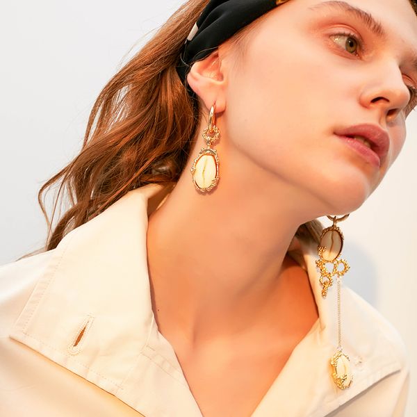 

europe and the united states metal asymmetric earrings with the paragraph long paragraph new conch earrings jewelry female, Golden;silver