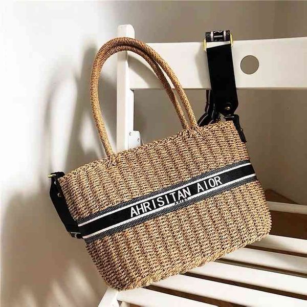 

2022 latest models handbag wholesale fashion straw woven beach bag cabe basket one shoulder hand leather women's bag