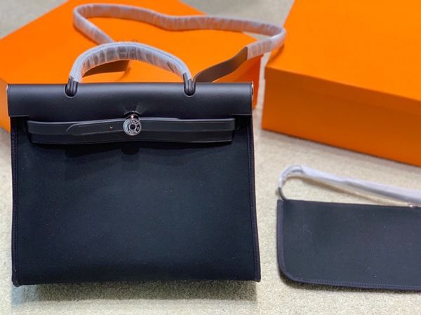 

herbag head leather with canvas and small inner bag