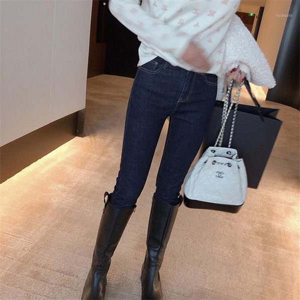 

a new line of tight waisted jeans for women looks slimmer and taller1, Blue