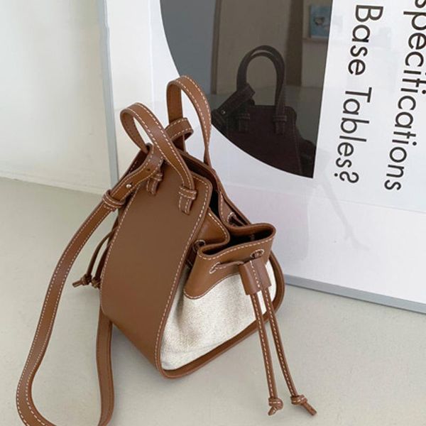 

2020 new fashion exquisite pu splicing unique drawstring opening large capacity shoulder bag crossbody bag office daily
