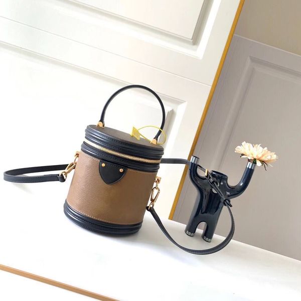 

fashion cosmetic bag mini beauty case reverse coated canvas petite size crossbody removable strap drum hand bag cannes 43986