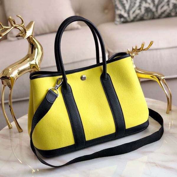 

оптовый желтый эст 7colors мешок сада партии, size30cm, togo кожи + холст, также имеет размер 36см с разной ценой, много других цветов
