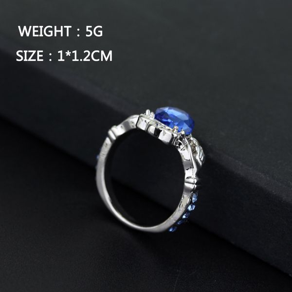 

ring, holding a crystal crown of love wedding ring, blue crystal ring, Golden;silver
