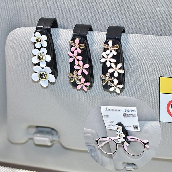 

daisy diamond spectacle rack automobile business card female chrysanthemum silicone material car diamond interior supplies1