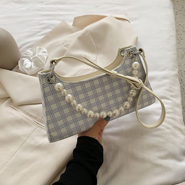 

net red texture women 2020 summer new fashion pearl lattice armpit foreign style single bagshoulder bag shoulder bagmessenger bag cic3k cic3