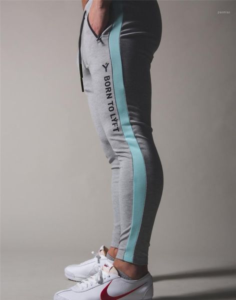 

new gym training fitness pants men women stitching fashion running pencil pants trendy brand feet1, Black